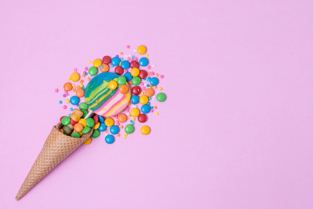 Candies in ice cream cone with copy space