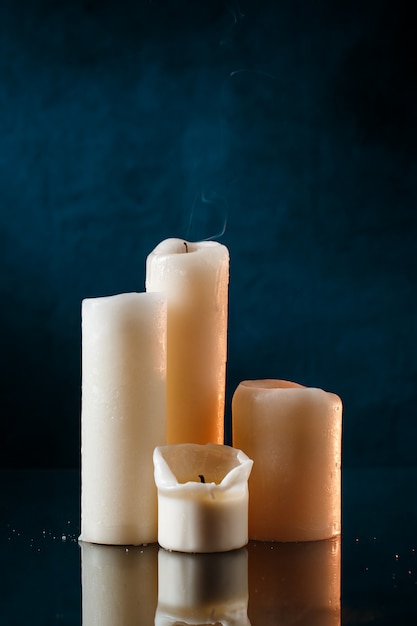 Candles over dark blue wall