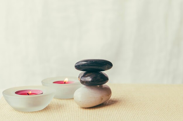 Candles and pile of stones