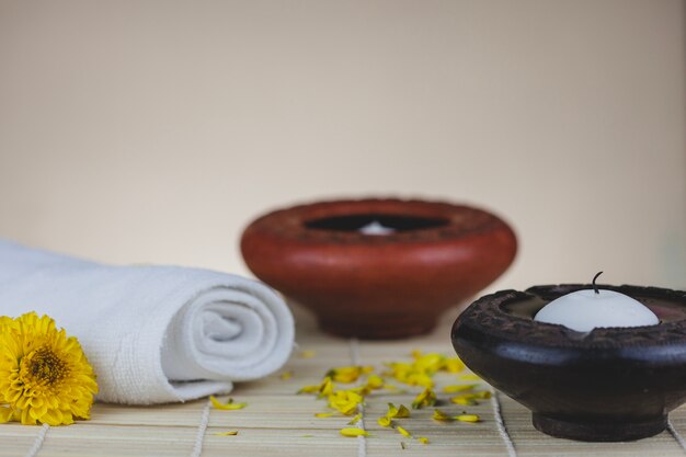 Candles, towel and flower