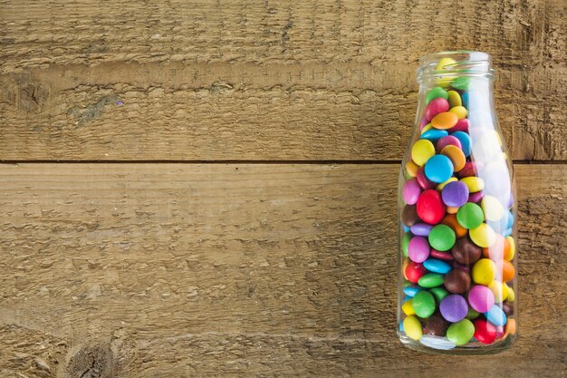 Candy buttons in bottle