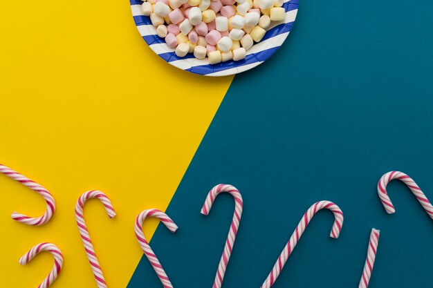 Candy canes and plate with candy