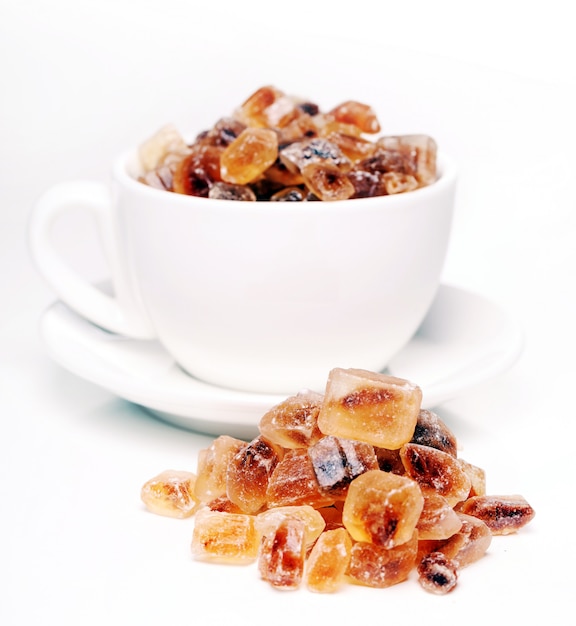 Candy sugar on a stick over white background