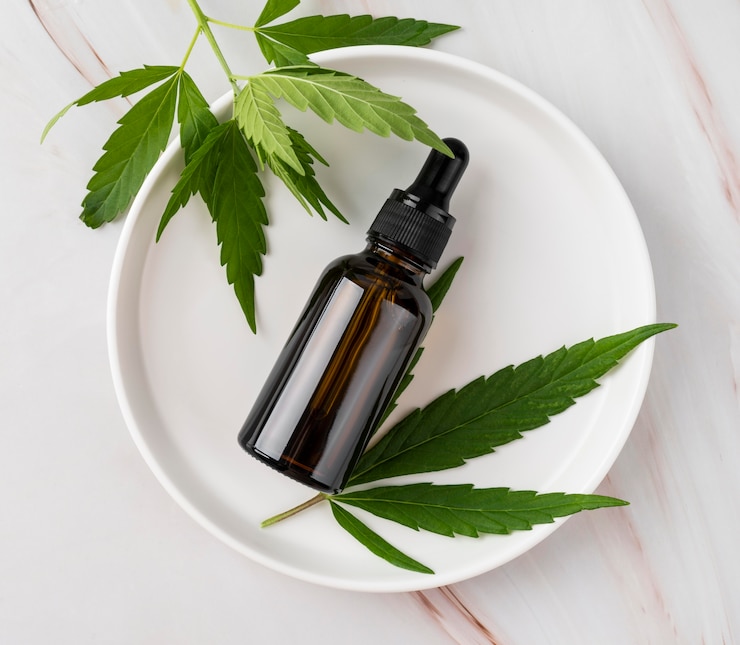Free Photo cannabis oil bottle arrangement