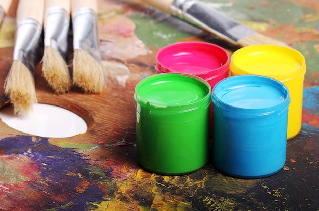 Cans with colorful paint