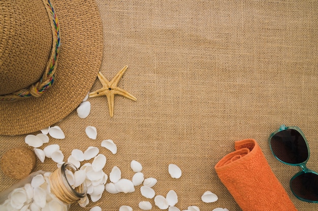 Canvas surface with seashells and summer elements