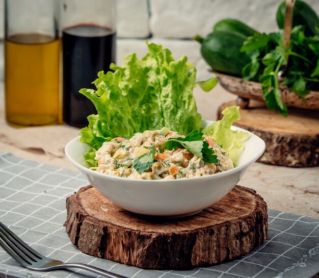 capital salad on wooden board