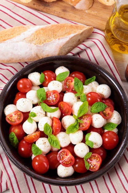 Caprese salad with mozzarella cheese and basil