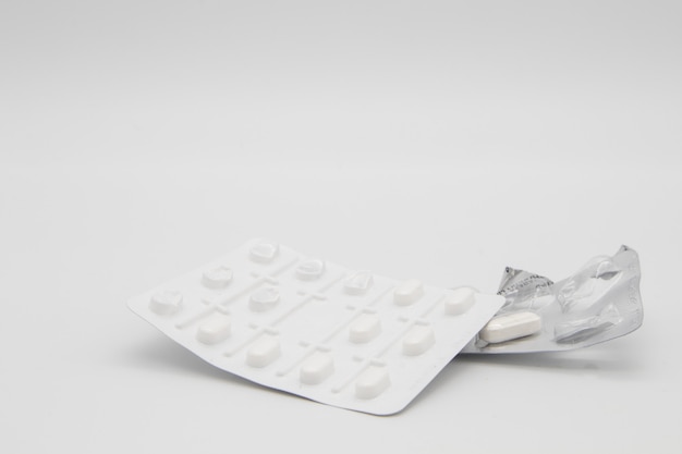 Capsules/pills/tablets isolated against a white background