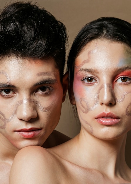 Captivating couple posing with painted faces