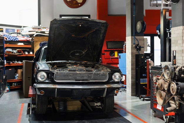 Car being taking care of in workshop