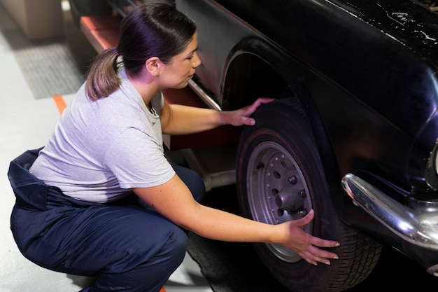 Car being taking care of in workshop