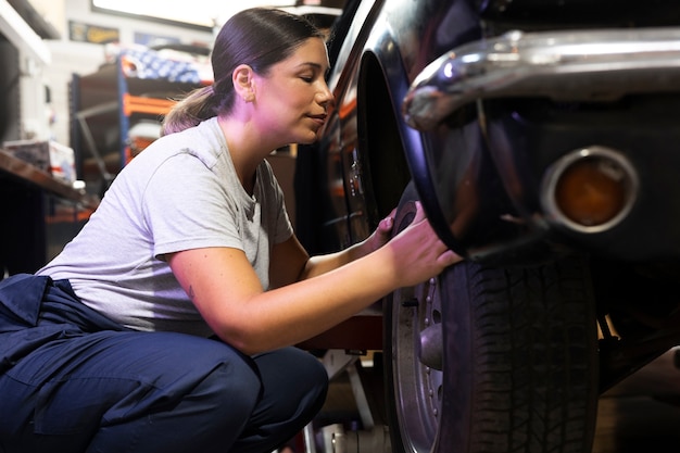 Car being taking care of in workshop