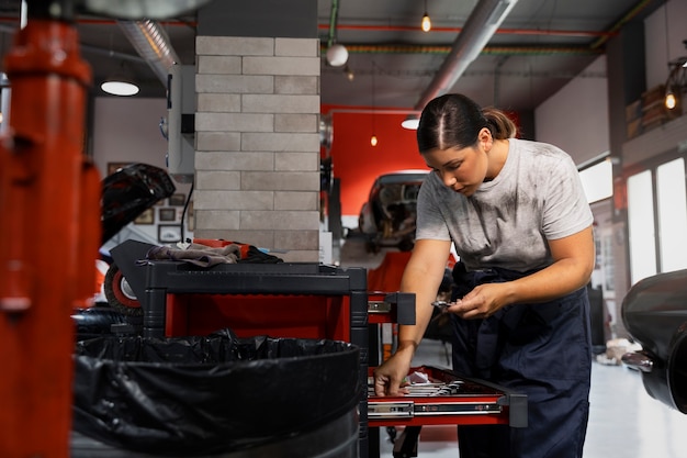 Free photo car being taking care of in workshop