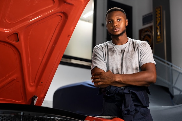 Free photo car being taking care of in workshop