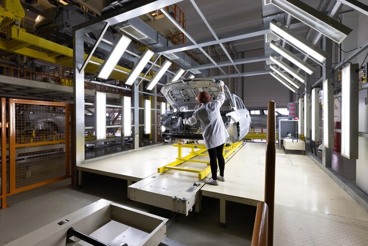 Free Photo car bodies are on assembly line factory for production of cars modern automotive industry a car being checked before being painted in a hightech enterprise