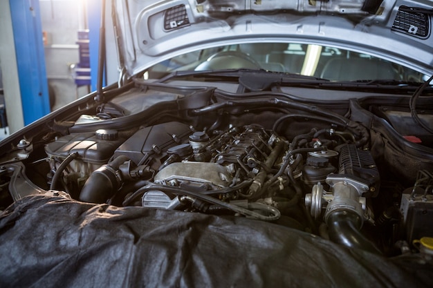 Car engine in repair garage