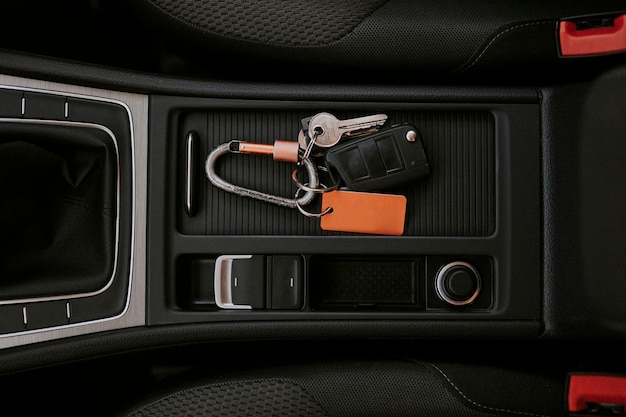 Free photo car key in a center console space