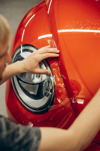 Car wrapping with foil at car service