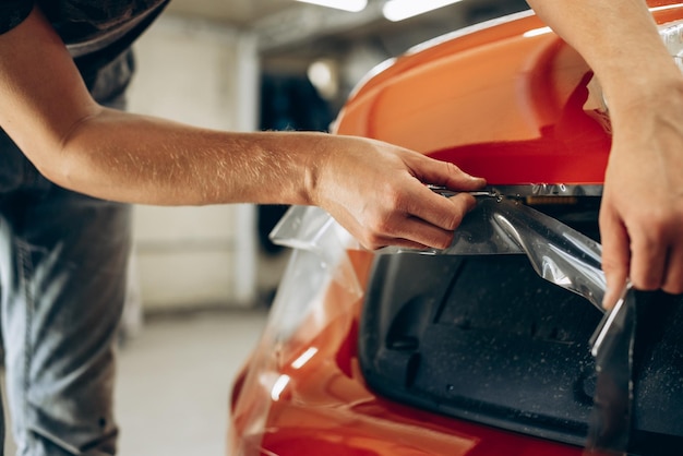 Car wrapping with foil at car service