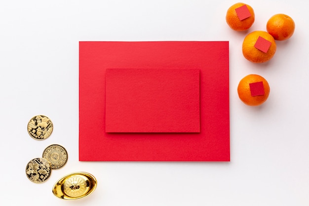 Foto gratuita card mock-up con monete d'oro nuovo anno cinese