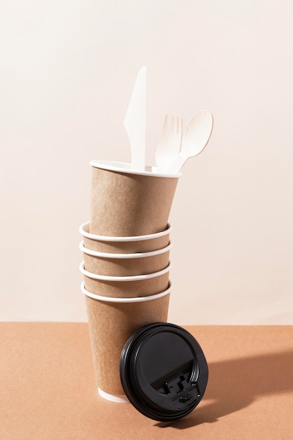 Cardboard knife and fork in paper cups