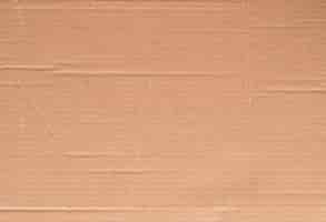 Free photo cardboard paper texture, brown carton material surface