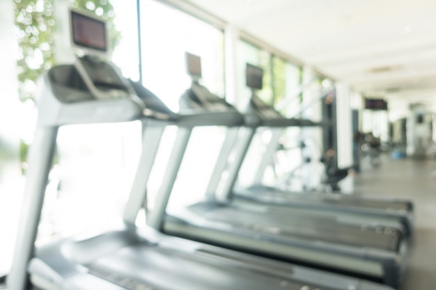 Cardio machines in a gym blurry