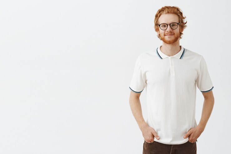 Free Photo carefree handsome bearded redhead guy smiling and looking upbeat