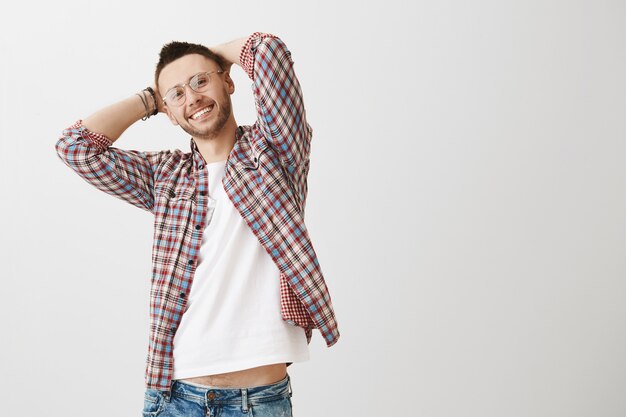 Carefree young guy posing