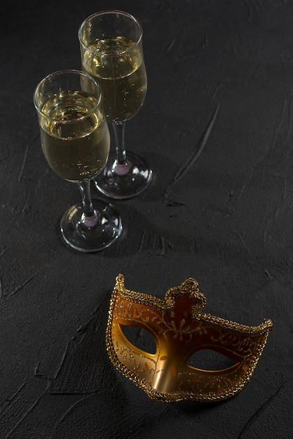 Carnival mask with champagne glasses 