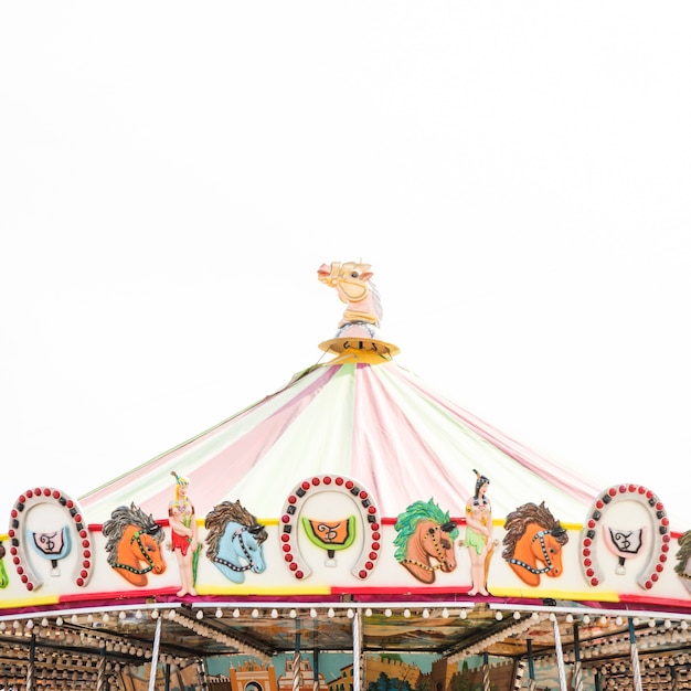 Carousel roof decoration against white background