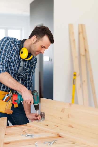 Carpenter creating new furniture