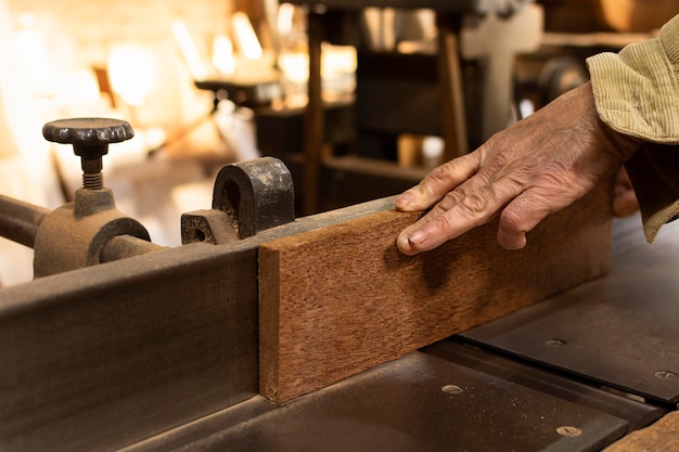 Carpenter cutting wood