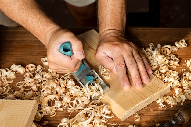 Carpenter working high view