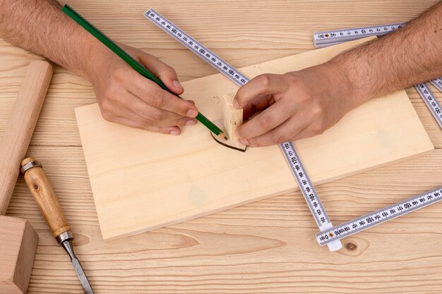 Carpenter working on wood in his workshop