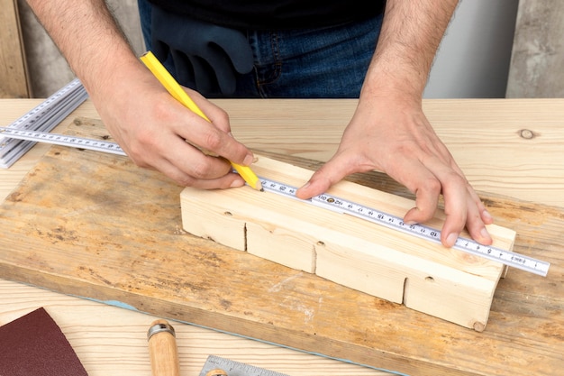 Carpentry concept ruler and pencil high view