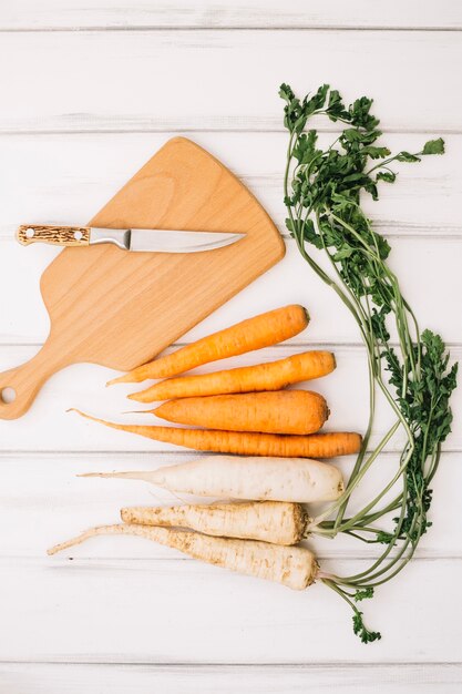 Carrot and cutting board