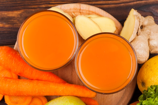 Carrot juice in glass cups