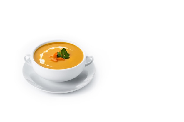 Free photo carrot soup with cream and parsley