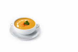 Free photo carrot soup with cream and parsley