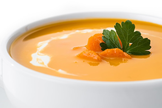 Carrot soup with cream and parsley