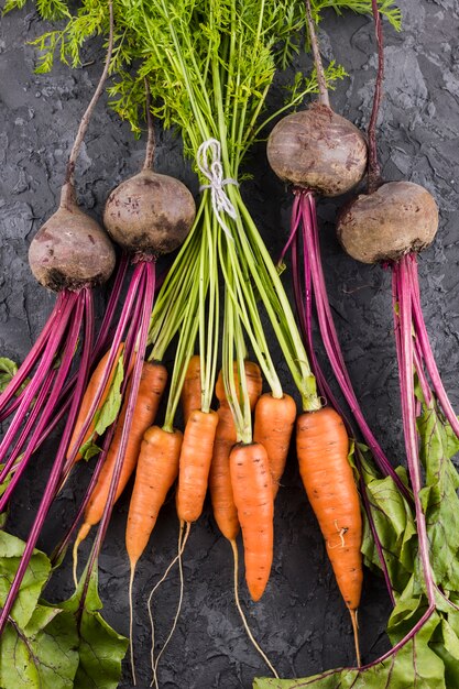 Carrots and beetroot top view