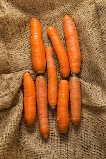 Free photo carrots on blanket