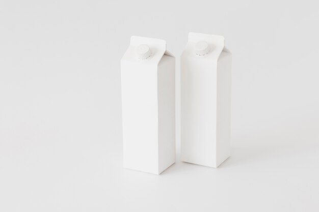 Carton containers for dairy produce