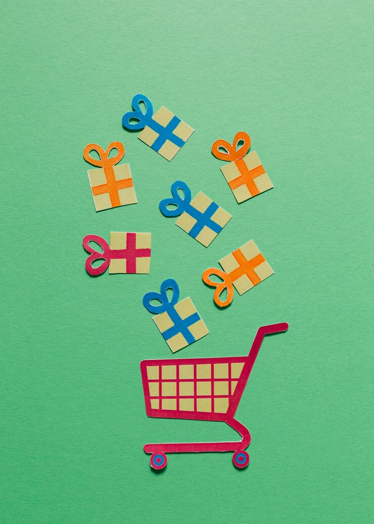 Free Photo carton gift boxes and shopping trolley 