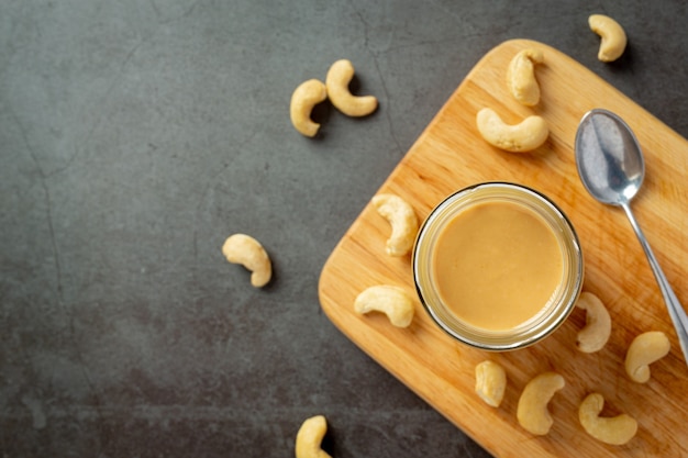 Cashew butter on dark background