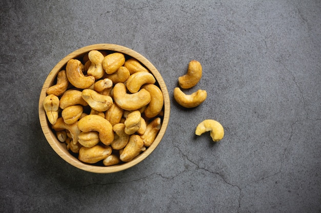 Cashew nuts with salt in bowl on table