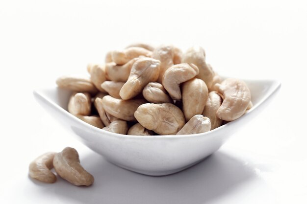 Cashews on white bowl