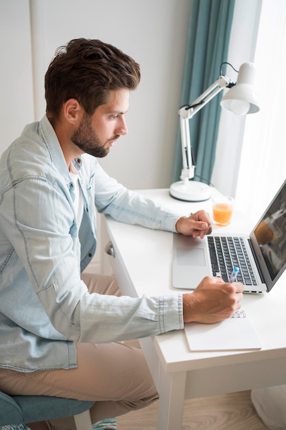 Casual adult male working from home